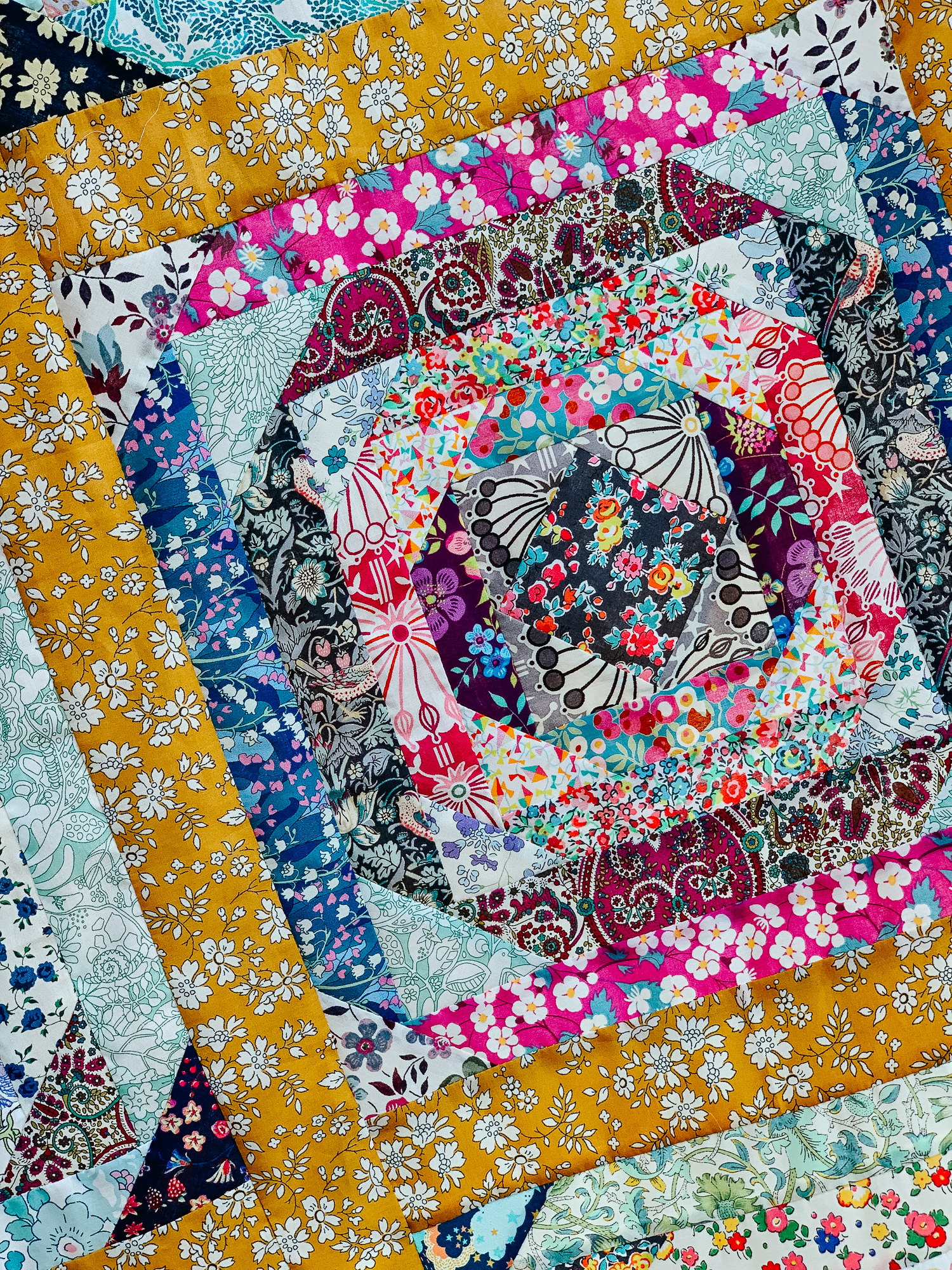 Pineapple quilt with Liberty lawn scraps