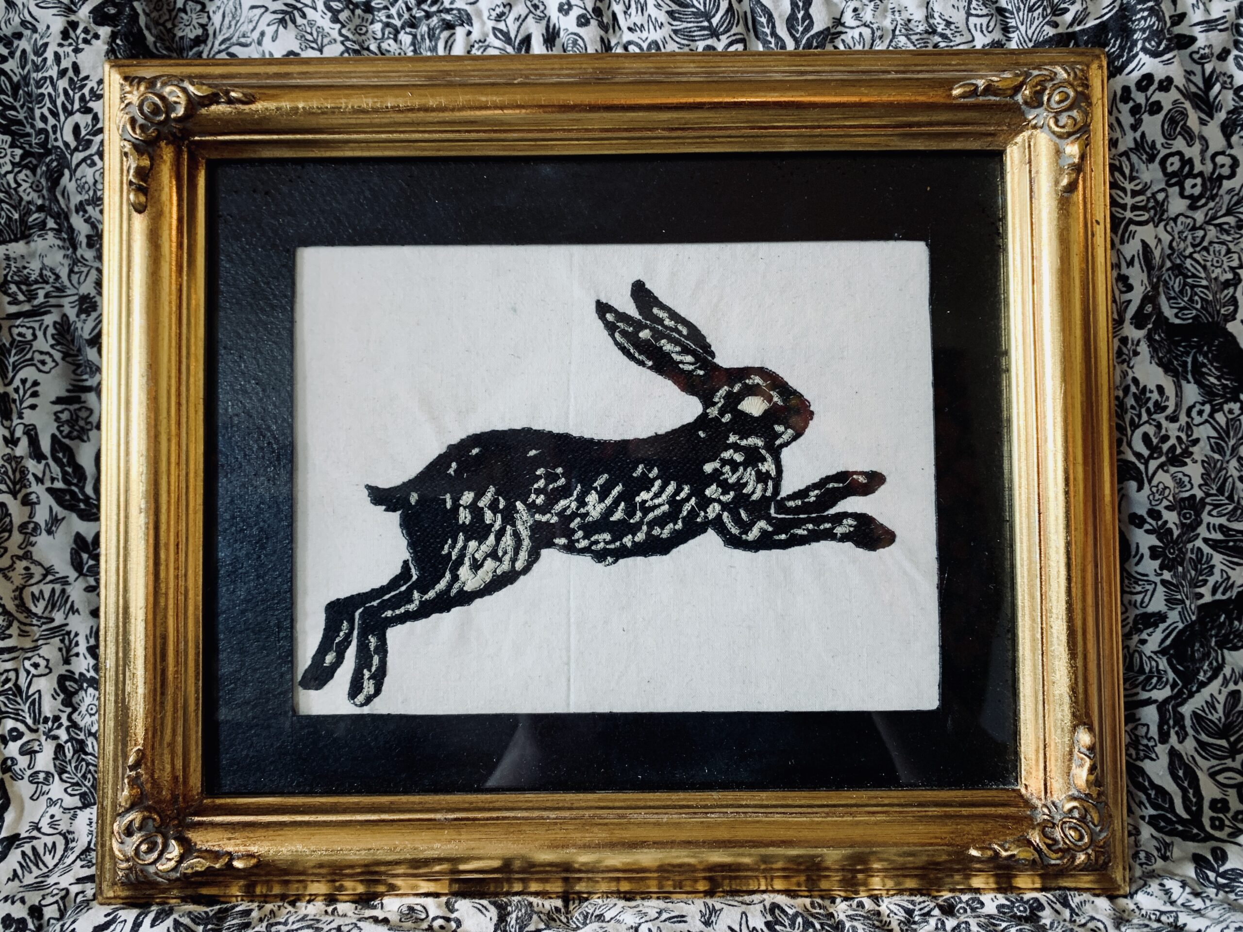 framed fable embroidery